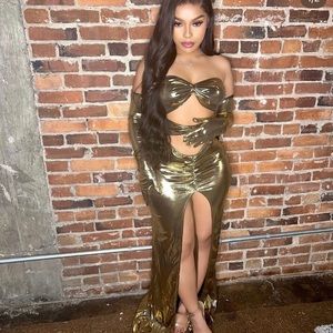 Beautiful gold dress with gloves.